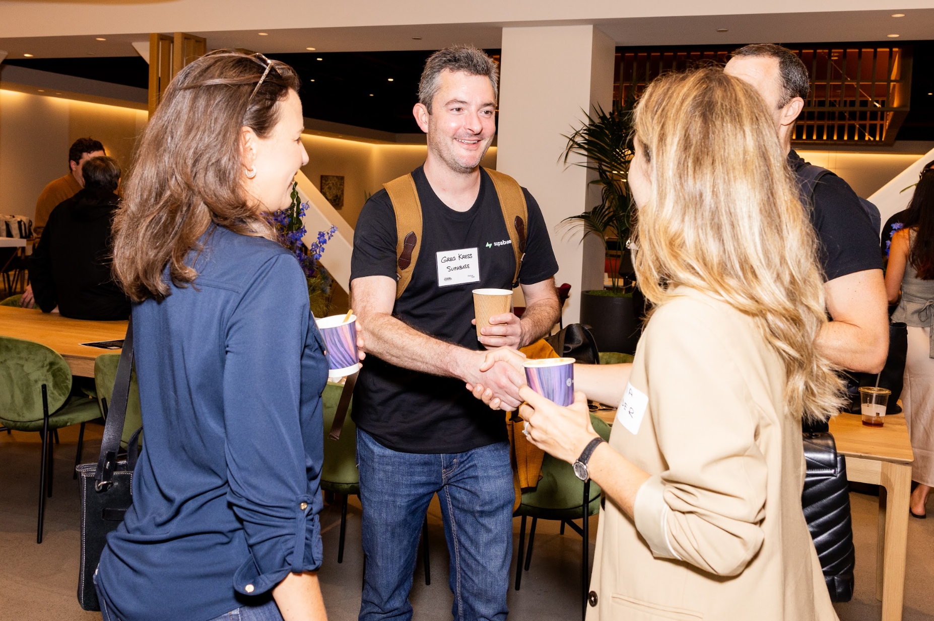 Attendees introducing themselves over coffee at Inside Summit
