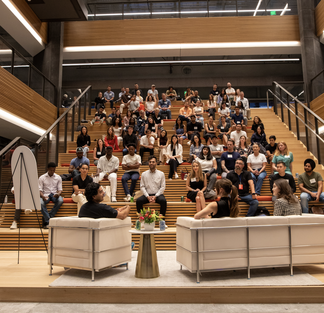 The audience gathered in an amphitheater at a past Inside Summit