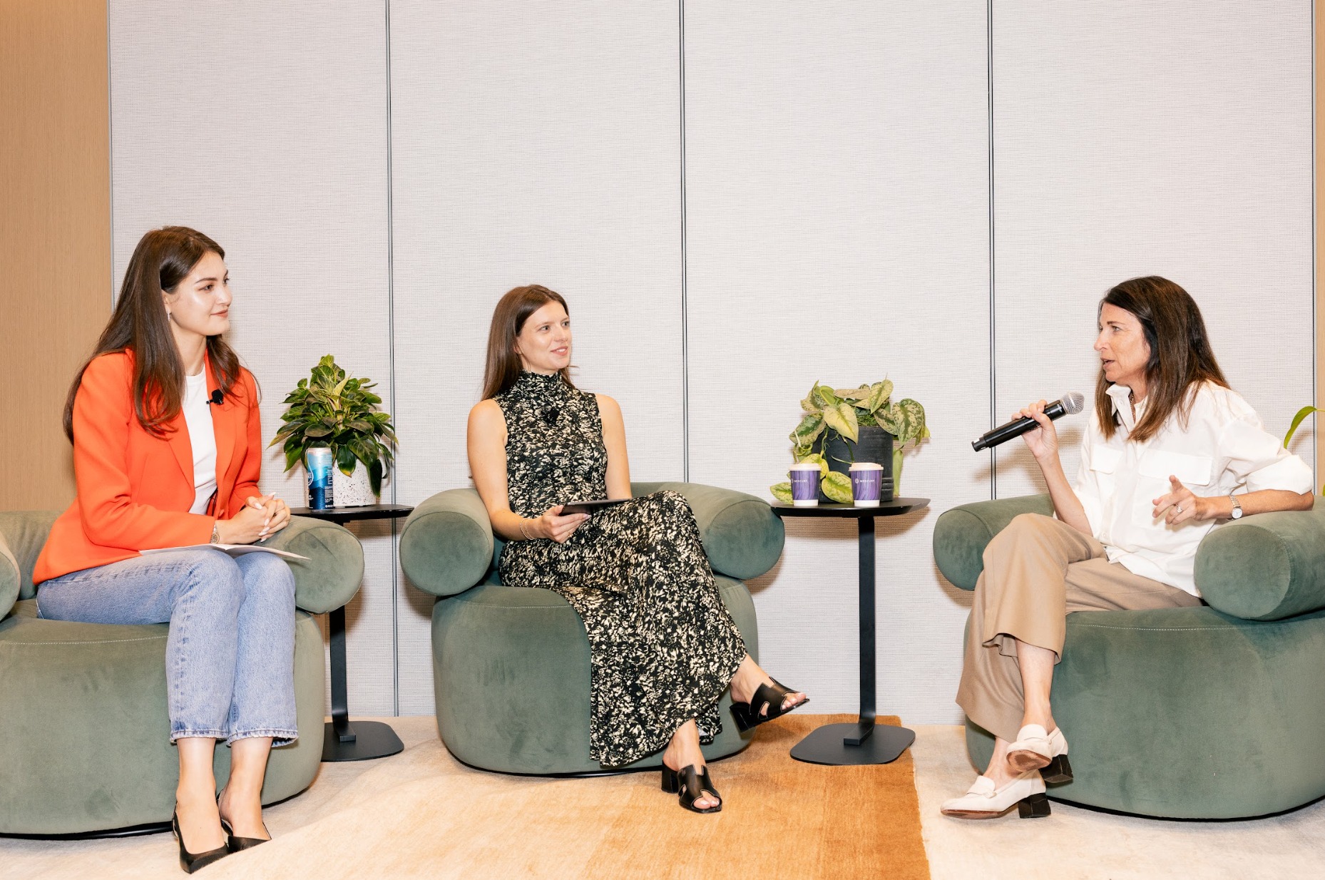Three women in a live panel conversation at Inside Summit